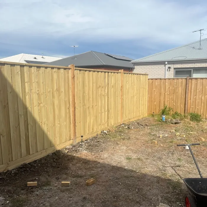 Completed timber paling boundary fence in a new-build backyard by Mickleham Fencing