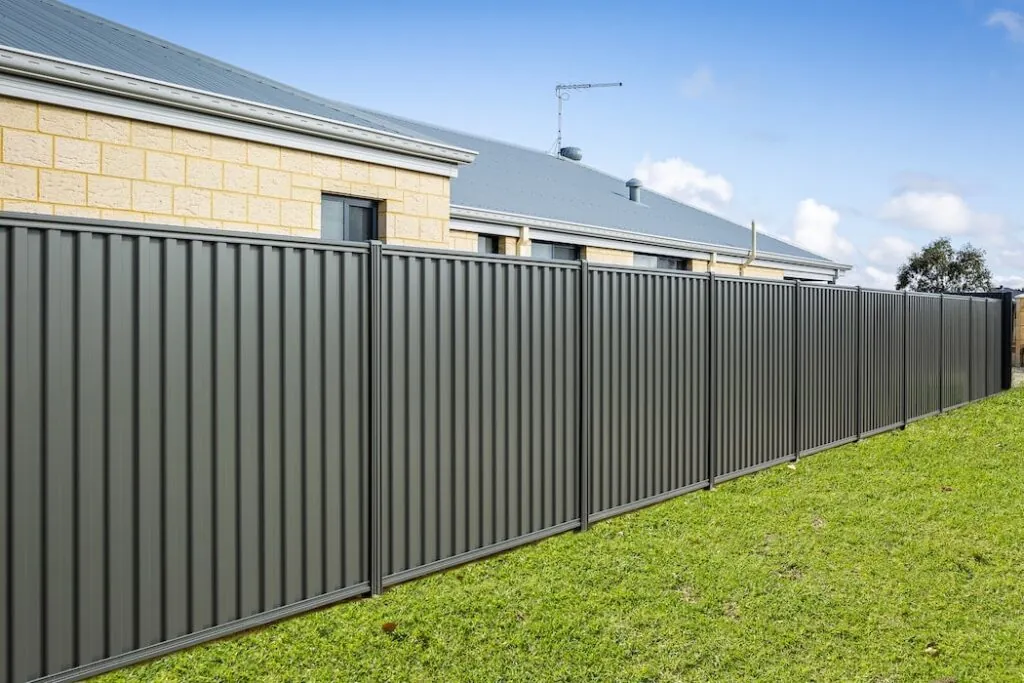 Colorbond steel boundary fence installed by Mickleham Fencing