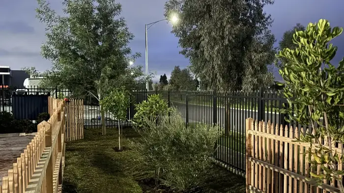 Landscaped yard with buffalo grass turf and new timber picket fencing